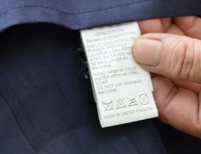 マッキントッシュゴム引きコートの洗濯表示タグ